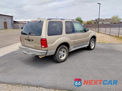 Czwarte zdjęcie samochodu z boku: 2003 FORD EXPLORER SPORT VIN:1FMYU60E13UA37301 - miniatura