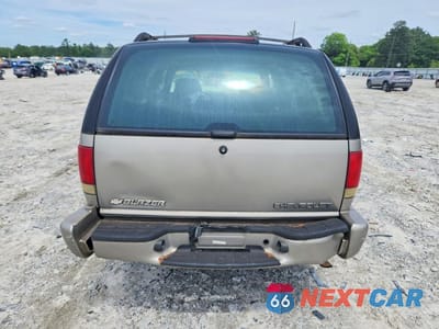 Zdjęcie 6 z 13 samochodu: 2003 CHEVROLET BLAZER VIN:1GNCS13X43K172621 - miniatura