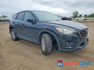 Czwarte zdjęcie samochodu z boku: 2016 MAZDA CX-5 TOURING VIN:JM3KE4CYXG0617653 - miniatura