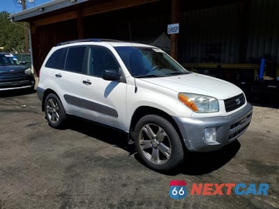 Czwarte zdjęcie samochodu z boku: 2002 TOYOTA RAV4 BASE VIN:JTEHH20V420129246 - miniatura
