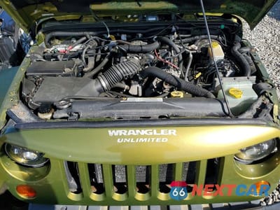 Zdjęcie 11 z 13 samochodu: 2007 JEEP WRANGLER SAHARA VIN:1J8GA59147L161148 - miniatura