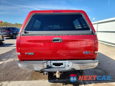 Zdjęcie 6 z 12 samochodu: 2002 FORD F150 VIN:1FTRX18L52NB47637 - miniatura