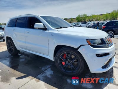 Czwarte zdjęcie samochodu z boku: 2014 JEEP GRAND CHEROKEE SRT-8 VIN:1C4RJFDJ1EC244384 - miniatura