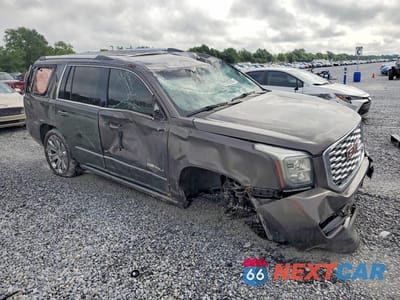 Czwarte zdjęcie samochodu z boku: 2019 GMC YUKON DENALI VIN:1GKS1CKJ0KR330947 - miniatura
