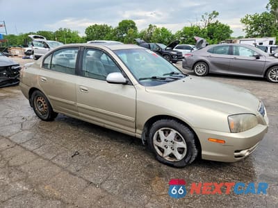 Czwarte zdjęcie samochodu z boku: 2005 HYUNDAI ELANTRA GLS VIN:KMHDN46D65U009074 - miniatura