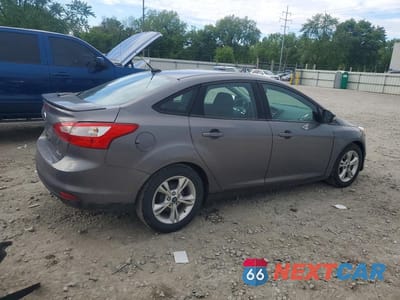 Trzecie zdjęcie samochodu z tyłu: 2014 FORD FOCUS SE VIN:1FADP3F27EL340295 - miniatura