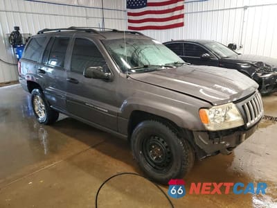 Czwarte zdjęcie samochodu z boku: 2004 JEEP GRAND CHEROKEE LAREDO VIN:1J4GW48S64C263246 - miniatura