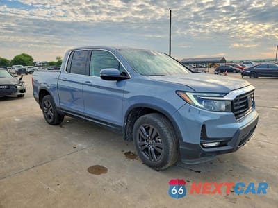 Czwarte zdjęcie samochodu z boku: 2022 HONDA RIDGELINE RTL VIN:5FPYK3F73NB503279 - miniatura
