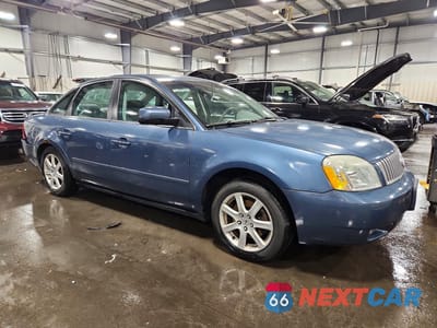 Czwarte zdjęcie samochodu z boku: 2005 MERCURY MONTEGO LUXURY VIN:1MEFM41115G603162 - miniatura