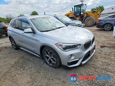 Czwarte zdjęcie samochodu z boku: 2016 BMW X1 XDRIVE28I VIN:WBXHT3C35GP881266 - miniatura