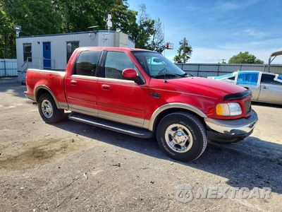Czwarte zdjęcie samochodu z boku: 2003 FORD F150 SUPERCREW VIN:1FTRW07683KC71641 - miniatura