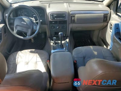 Zdjęcie 8 z 13 samochodu: 2004 JEEP GRAND CHEROKEE LAREDO VIN:1J4GW48N84C378439 - miniatura