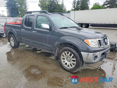 Czwarte zdjęcie samochodu z boku: 2010 NISSAN FRONTIER SE V6 VIN:1N6AD0FV8AC415575 - miniatura