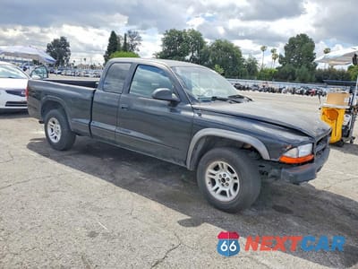 Czwarte zdjęcie samochodu z boku: 2002 DODGE DAKOTA BASE VIN:1B7GL12X32S710832 - miniatura
