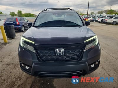 Piąte zdjęcie samochodu w środku: 2020 HONDA PASSPORT ELITE VIN:5FNYF8H0XLB016264 - miniatura