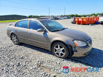Czwarte zdjęcie samochodu z boku: 2002 NISSAN ALTIMA SE VIN:1N4BL11D72C114088 - miniatura