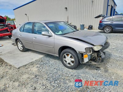Czwarte zdjęcie samochodu z boku: 1999 NISSAN ALTIMA XE VIN:1N4DL01D6XC260718 - miniatura