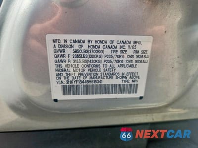 Zdjęcie 13 z 13 samochodu: 2006 HONDA PILOT EX VIN:2HKYF18446H516341 - miniatura