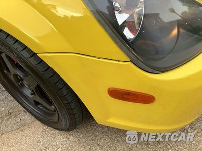 Zdjęcie 12 z 14 samochodu: 2001 TOYOTA MR2 SPYDER VIN:JTDFR320X10033944 - miniatura