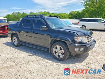 Czwarte zdjęcie samochodu z boku: 2010 HONDA RIDGELINE RTL VIN:5FPYK1F56AB001802 - miniatura