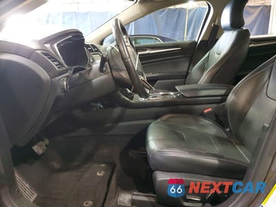 Zdjęcie 7 z 12 samochodu: 2019 FORD FUSION TITANIUM VIN:3FA6P0RU2KR236296 - miniatura