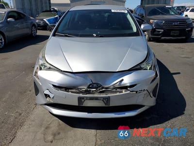 Piąte zdjęcie samochodu w środku: 2017 TOYOTA PRIUS ONE VIN:JTDKBRFUXH3044552 - miniatura