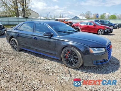 Czwarte zdjęcie samochodu z boku: 2015 AUDI A8 L QUATTRO VIN:WAU3GAFD1FN014250 - miniatura
