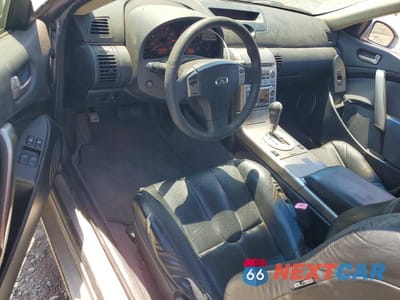 Zdjęcie 8 z 12 samochodu: 2004 INFINITI G35 BASE VIN:JNKCV54E64M802485 - miniatura