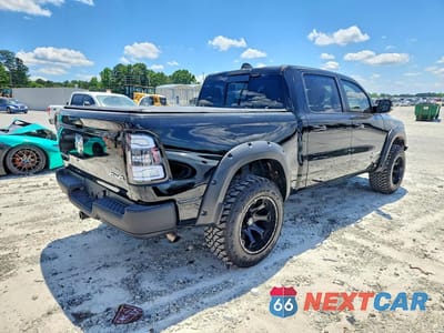 Trzecie zdjęcie samochodu z tyłu: 2022 RAM 1500 BIG HORN VIN:1C6RRFFG1NN460368 - miniatura
