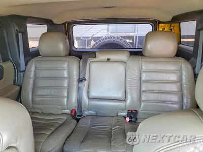 Zdjęcie 10 z 13 samochodu: 2005 HUMMER H2 VIN:5GRGN23U65H129183 - miniatura