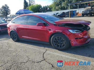 Czwarte zdjęcie samochodu z boku: 2024 TESLA MODEL X VIN:7SAXCAE59RF442017 - miniatura
