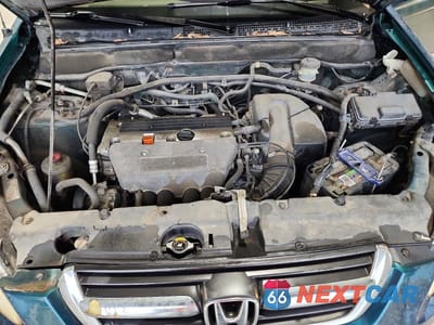 Zdjęcie 12 z 13 samochodu: 2003 HONDA CR-V LX VIN:JHLRD68463C011368 - miniatura