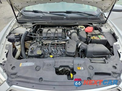 Zdjęcie 11 z 12 samochodu: 2014 FORD TAURUS SEL VIN:1FAHP2E83EG149760 - miniatura