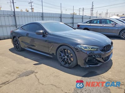 Czwarte zdjęcie samochodu z boku: 2019 BMW M850XI VIN:WBABC4C57KBU96451 - miniatura