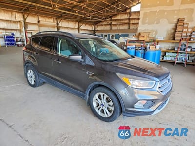 Czwarte zdjęcie samochodu z boku: 2018 FORD ESCAPE SE VIN:1FMCU0GD5JUB85405 - miniatura