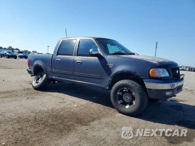 Czwarte zdjęcie samochodu z boku: 2003 FORD F150 SUPERCREW VIN:1FTRW08L63KD40752 - miniatura