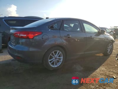 Trzecie zdjęcie samochodu z tyłu: 2015 FORD FOCUS SE VIN:1FADP3F20FL240895 - miniatura