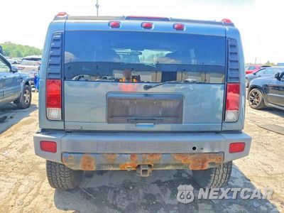 Zdjęcie 6 z 13 samochodu: 2005 HUMMER H2 VIN:5GRGN23U25H124398 - miniatura