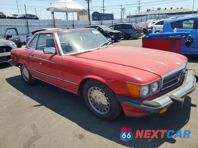Czwarte zdjęcie samochodu z boku: 1987 MERCEDES-BENZ 560 SL VIN:WDBBA48D7HA057689 - miniatura