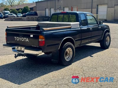 Czwarte zdjęcie samochodu z boku: 1996 TOYOTA TACOMA XTRACAB VIN:4TAWN72NXTZ150044 - miniatura