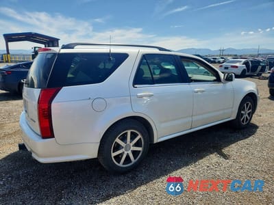Trzecie zdjęcie samochodu z tyłu: 2004 CADILLAC SRX VIN:1GYDE63A940126786 - miniatura