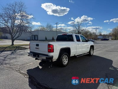 Czwarte zdjęcie samochodu z boku: 2016 GMC SIERRA K1500 SLE VIN:1GTV2MEC4GZ358153 - miniatura