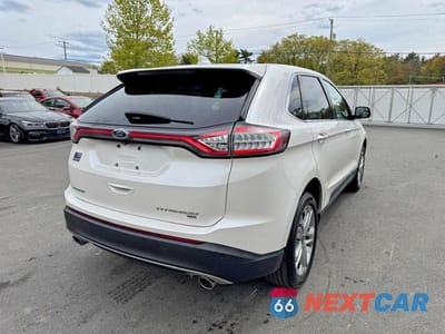 Trzecie zdjęcie samochodu z tyłu: 2018 FORD EDGE TITANIUM VIN:2FMPK4K86JBB66540 - miniatura