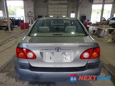 Zdjęcie 6 z 13 samochodu: 2003 TOYOTA COROLLA CE VIN:JTDBR32E032007869 - miniatura