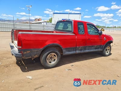 Trzecie zdjęcie samochodu z tyłu: 2003 FORD F150 VIN:1FTRX172X3NB39592 - miniatura