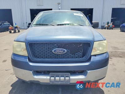 Piąte zdjęcie samochodu w środku: 2004 FORD F150 VIN:1FTRX12W44NC42339 - miniatura