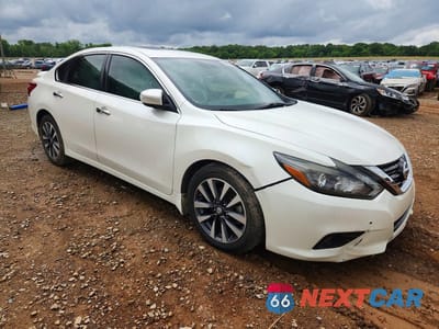 Czwarte zdjęcie samochodu z boku: 2016 NISSAN ALTIMA 2.5 SL VIN:1N4AL3AP0GC218091 - miniatura