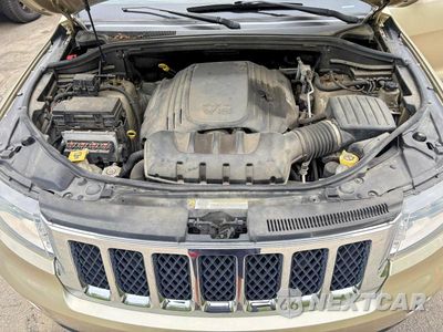 Zdjęcie 7 z 11 samochodu: 2011 JEEP GRAND CHEROKEE OVERLAND VIN:1J4RR6GT8BC605637 - miniatura