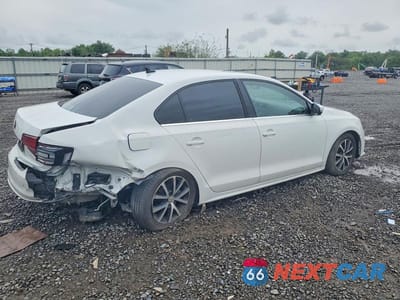 Trzecie zdjęcie samochodu z tyłu: 2017 VOLKSWAGEN JETTA SE VIN:3VWDB7AJ1HM415801 - miniatura