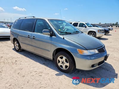 Czwarte zdjęcie samochodu z boku: 2000 HONDA ODYSSEY EX VIN:2HKRL1867YH523608 - miniatura